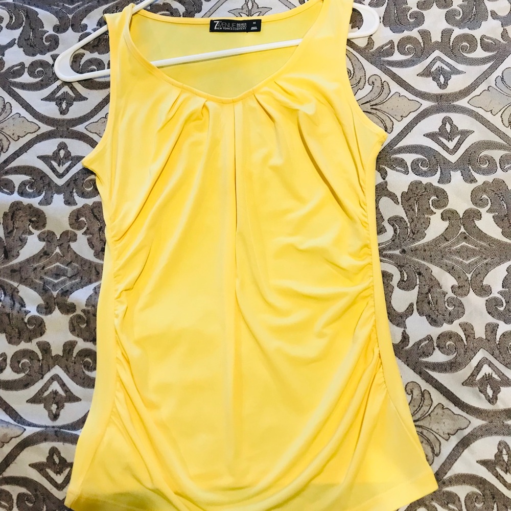 New York and company yellow top.